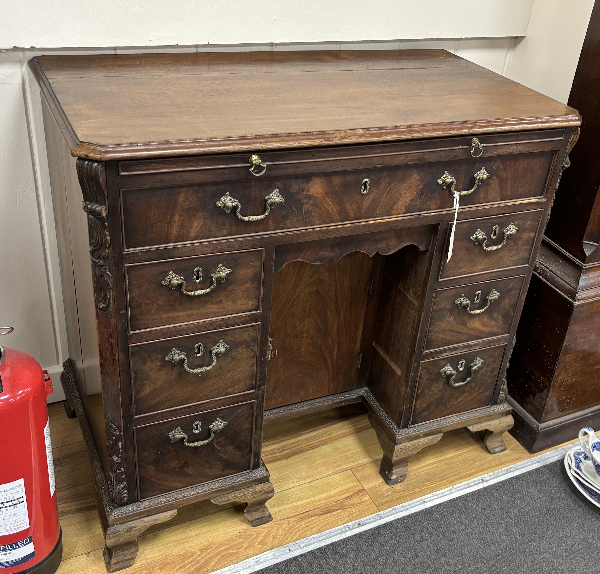 A George III mahogany kneehole dressing chest, width 94cm, depth 51cm, height 84cm